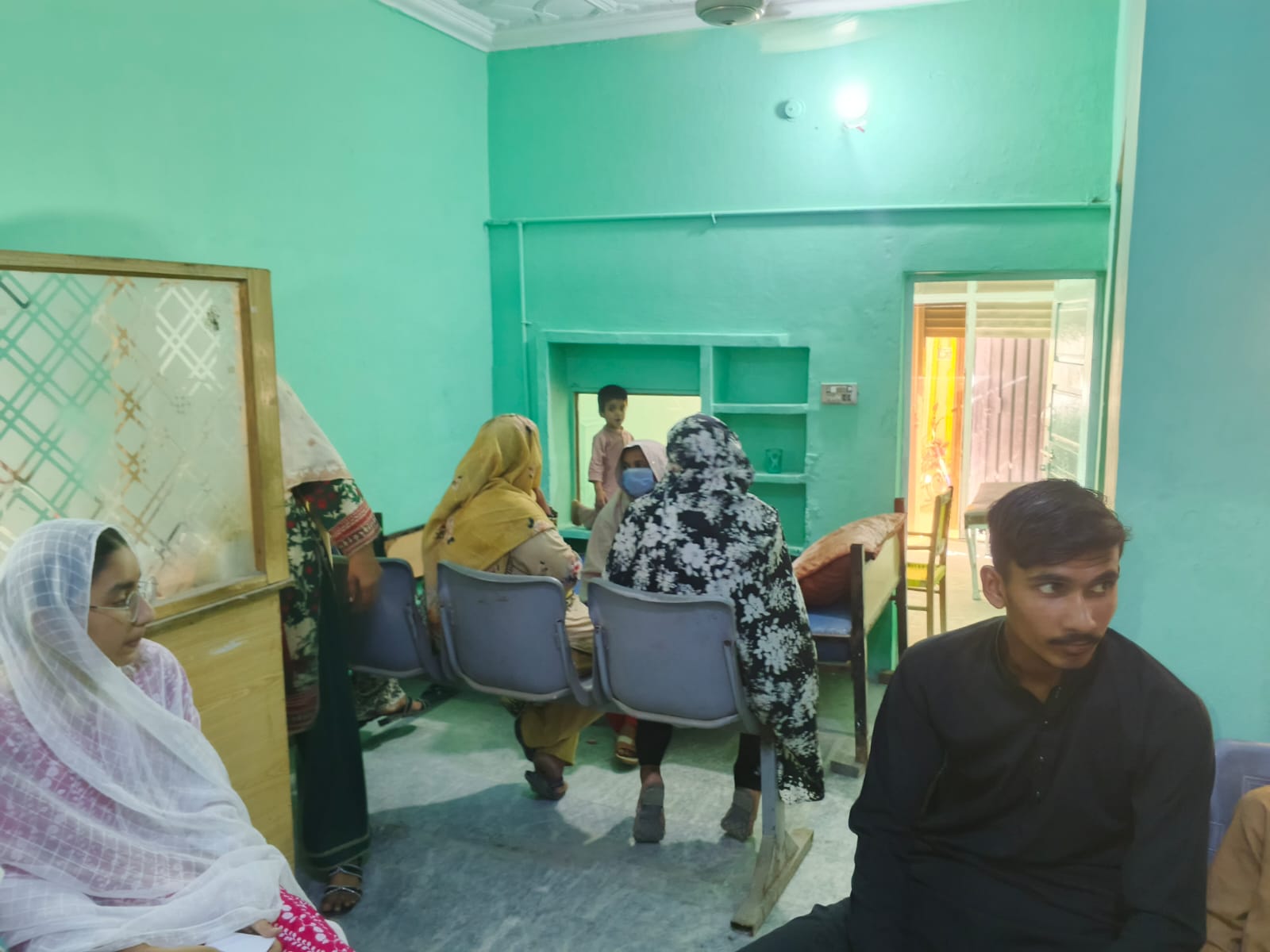 Patients waiting inside Bukhari Clinic in Sinawan